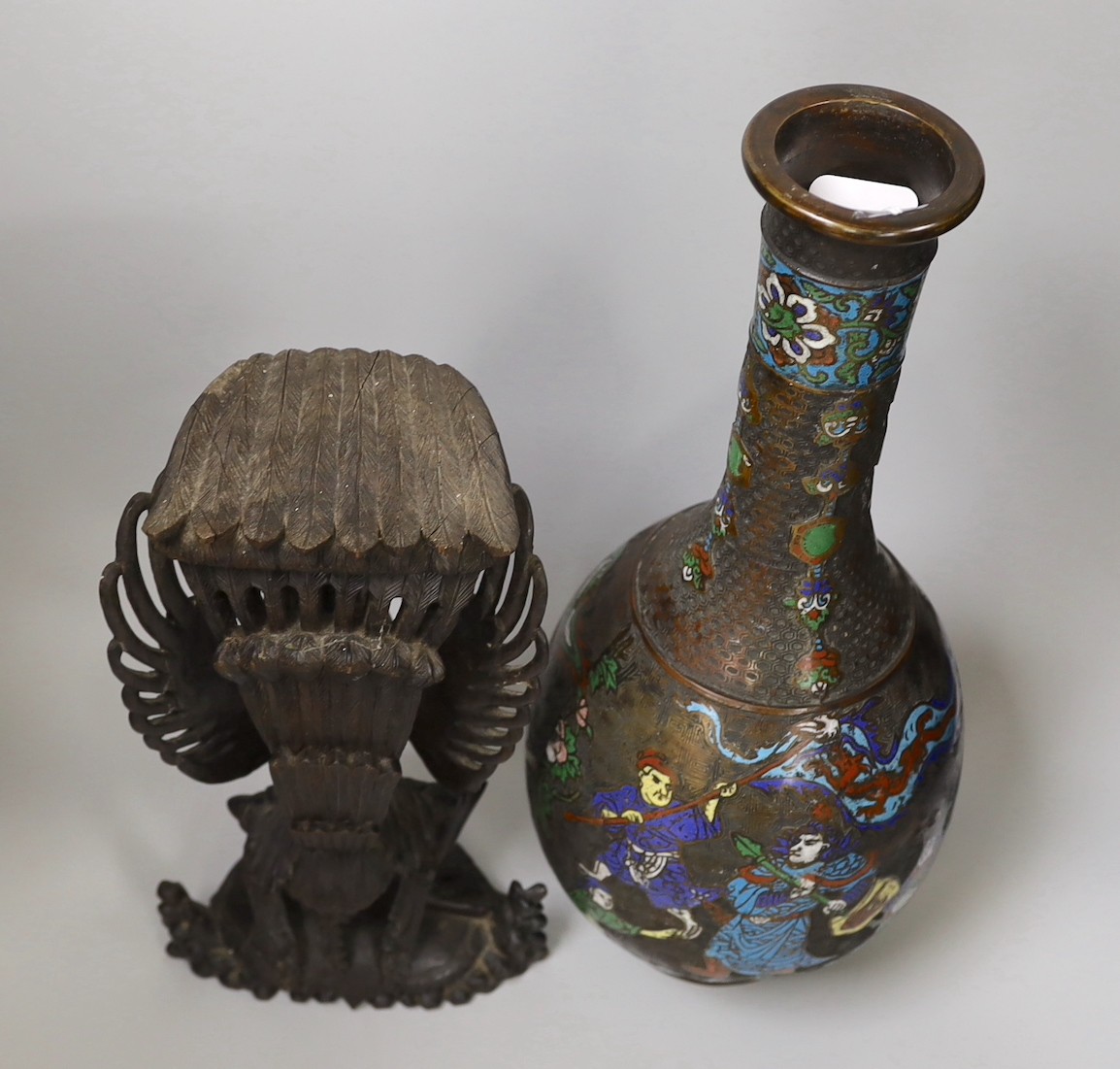 A large Japanese enamelled bronze vase and a Balinese wood carving. Tallest 44cm